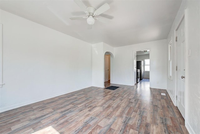 unfurnished room featuring ceiling fan and hardwood / wood-style flooring