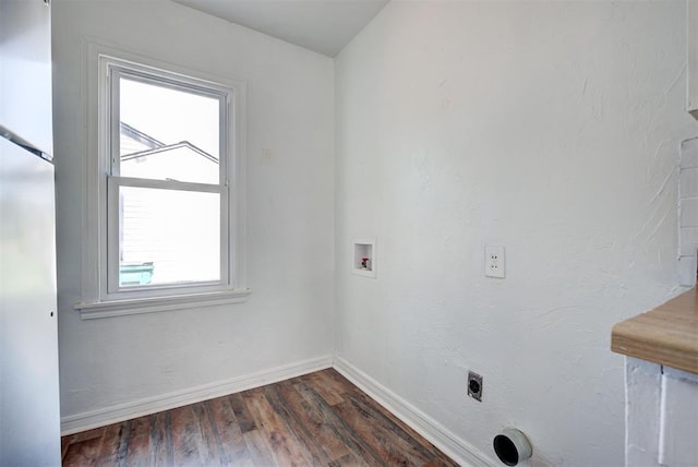 clothes washing area with washer hookup, dark wood-type flooring, and hookup for an electric dryer