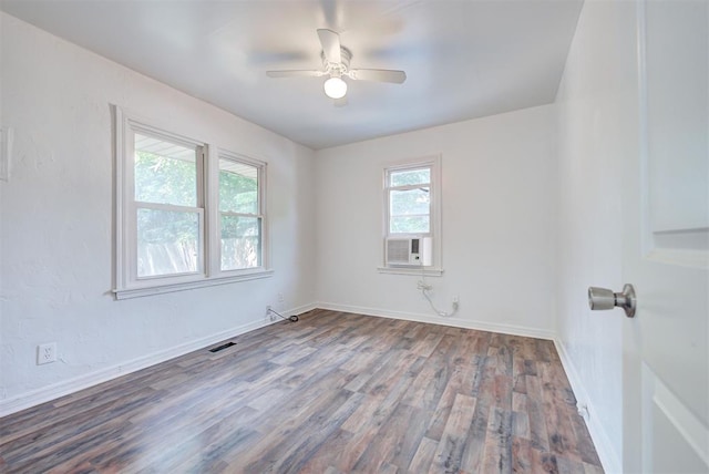 spare room featuring ceiling fan and hardwood / wood-style floors