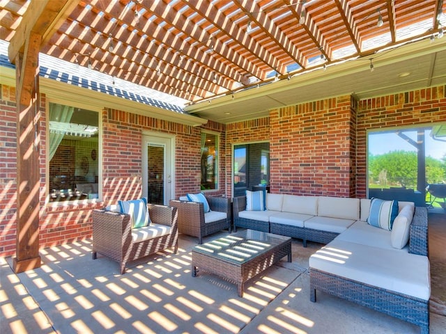 view of patio featuring outdoor lounge area and a pergola