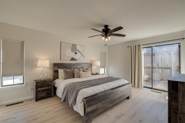 bedroom featuring ceiling fan, light wood-type flooring, and access to exterior