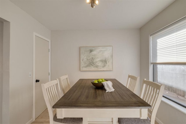 dining room featuring light hardwood / wood-style floors