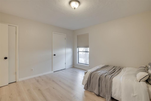 bedroom featuring light hardwood / wood-style floors