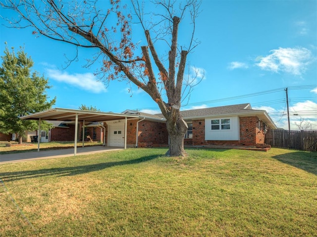 single story home featuring a carport and a front yard