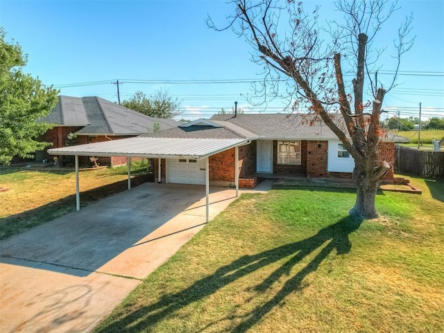 ranch-style house with a garage, a front yard, and a carport