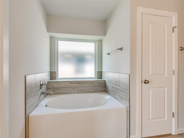 bathroom with a washtub