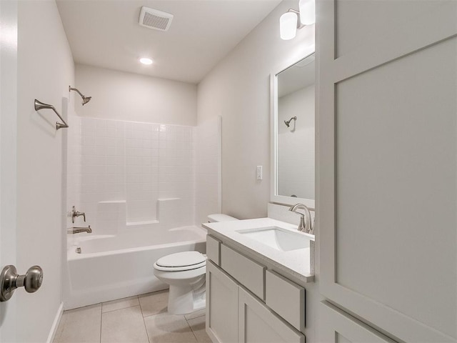 full bathroom featuring tile patterned flooring, vanity, toilet, and washtub / shower combination