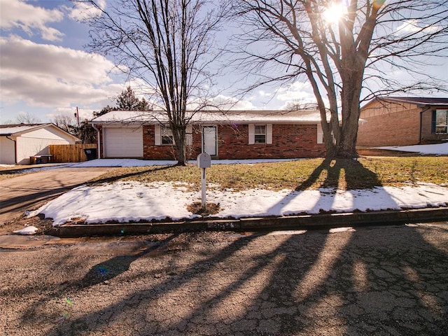 single story home with a garage