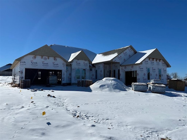 property under construction featuring cooling unit