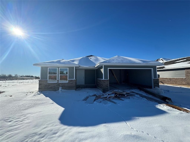 single story home with a garage