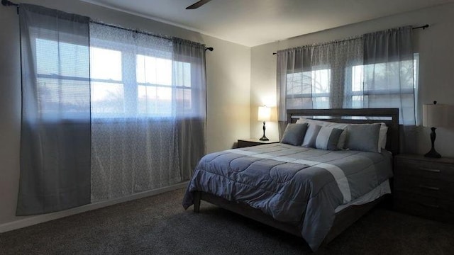 bedroom featuring ceiling fan and carpet flooring