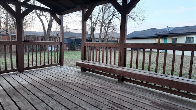 wooden deck with a yard