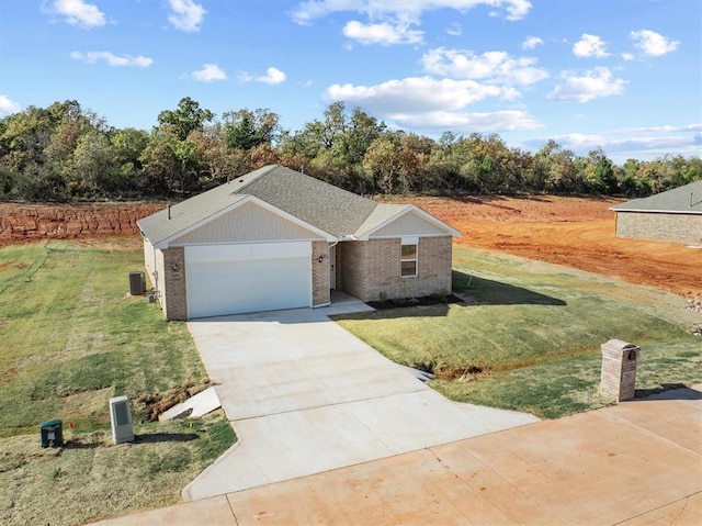 view of front facade featuring central AC unit, a garage, and a front lawn