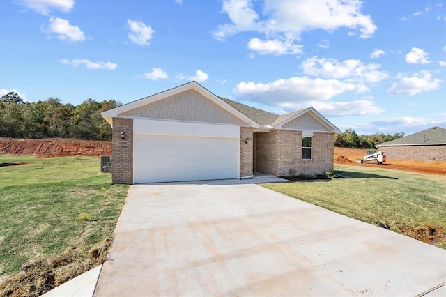 ranch-style house with a garage and a front lawn