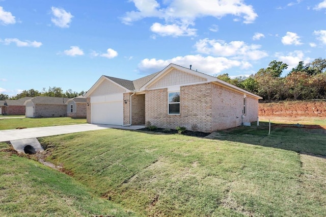 ranch-style home featuring a garage and a front lawn