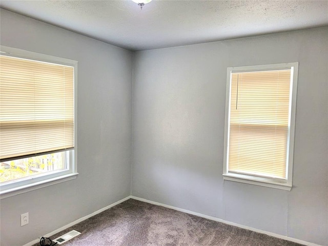 empty room with carpet floors