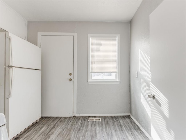 interior space with light hardwood / wood-style flooring