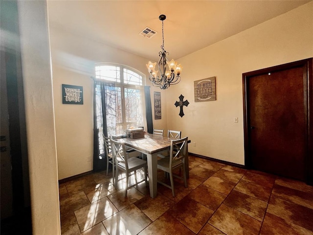 dining room featuring an inviting chandelier