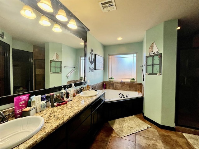 bathroom with tile patterned floors, separate shower and tub, and vanity