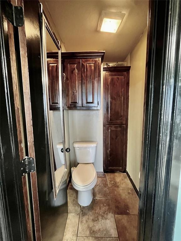 bathroom featuring toilet