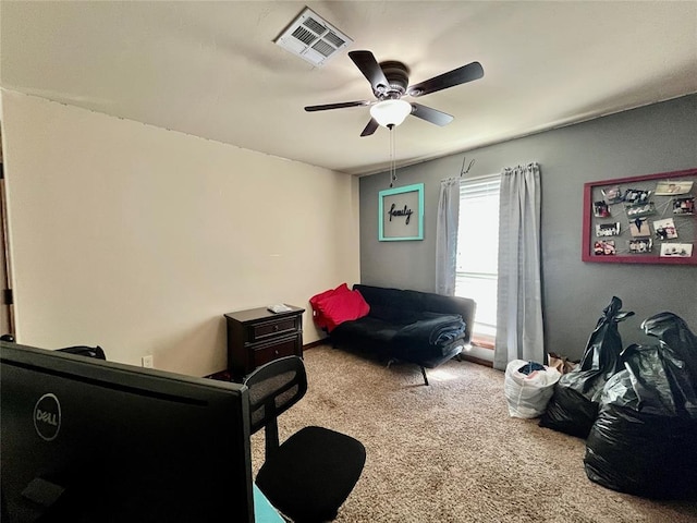 interior space with ceiling fan and carpet flooring