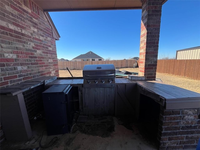 view of patio with area for grilling