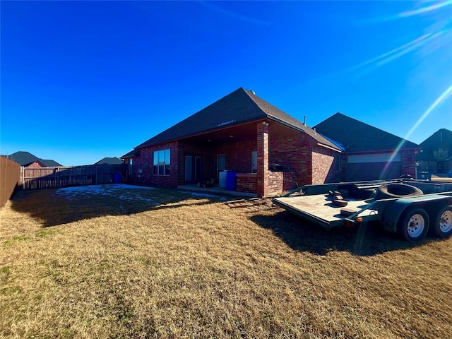 view of home's exterior featuring a lawn