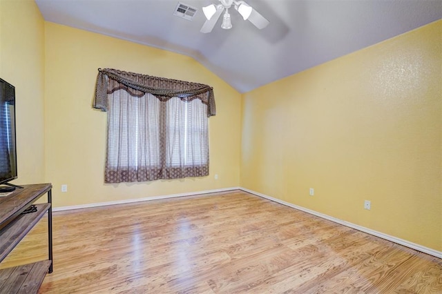 interior space featuring vaulted ceiling, ceiling fan, and light hardwood / wood-style floors