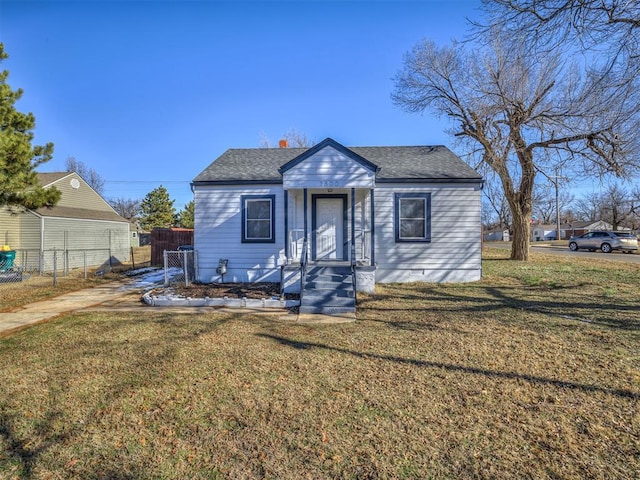 bungalow-style home featuring a front lawn