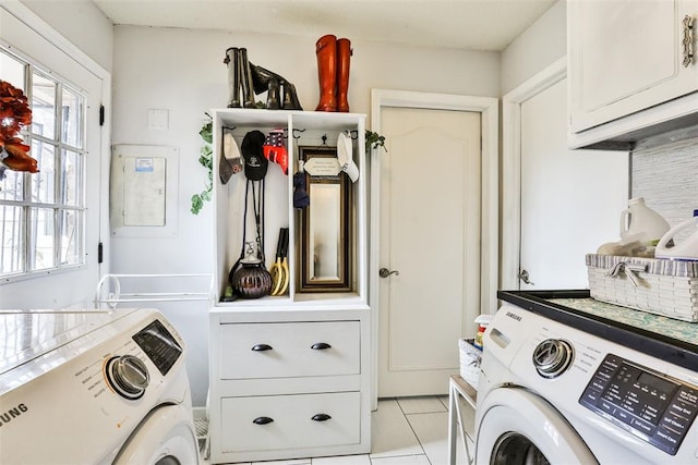 washroom with cabinets, light tile patterned floors, and independent washer and dryer