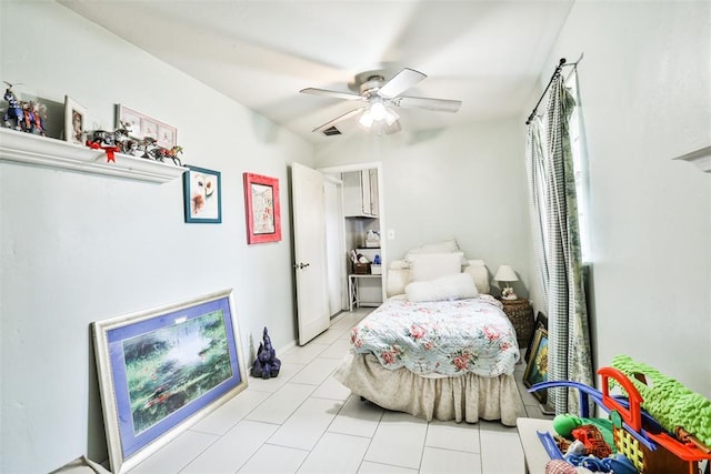 bedroom featuring ceiling fan and light tile patterned floors