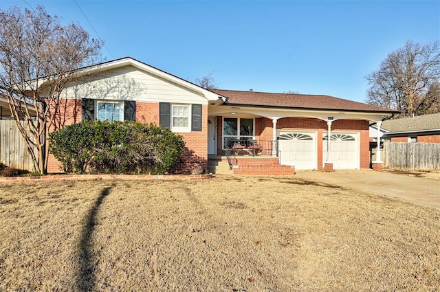 ranch-style home featuring a front lawn and a garage