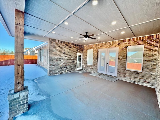 view of patio / terrace featuring ceiling fan and french doors