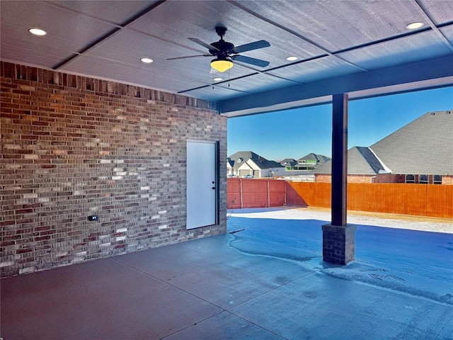 view of patio featuring ceiling fan