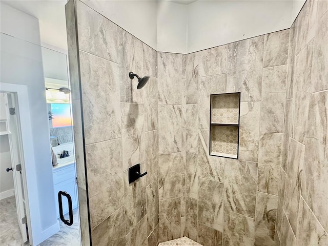 bathroom with a shower with shower door