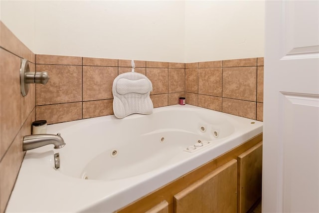 bathroom with a whirlpool tub