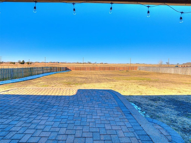 view of yard with a patio and a fenced backyard