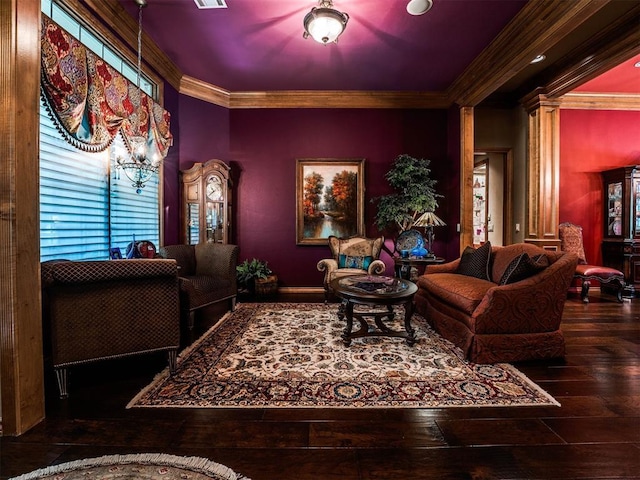 cinema featuring hardwood / wood-style flooring and ornamental molding