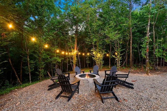 view of patio / terrace with a fire pit