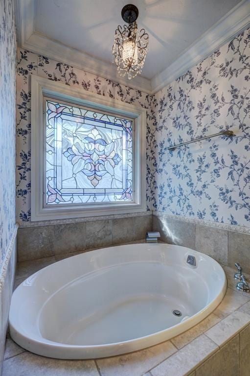 bathroom featuring a relaxing tiled tub and ornamental molding