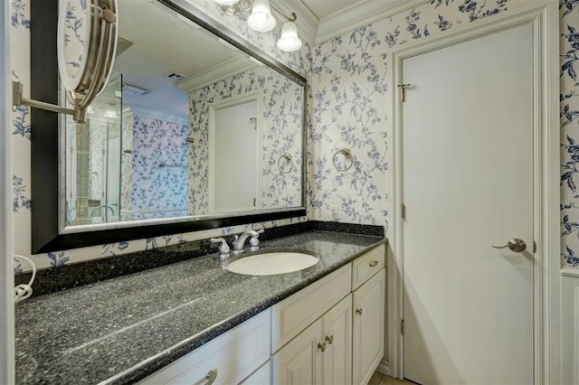 bathroom featuring vanity and crown molding