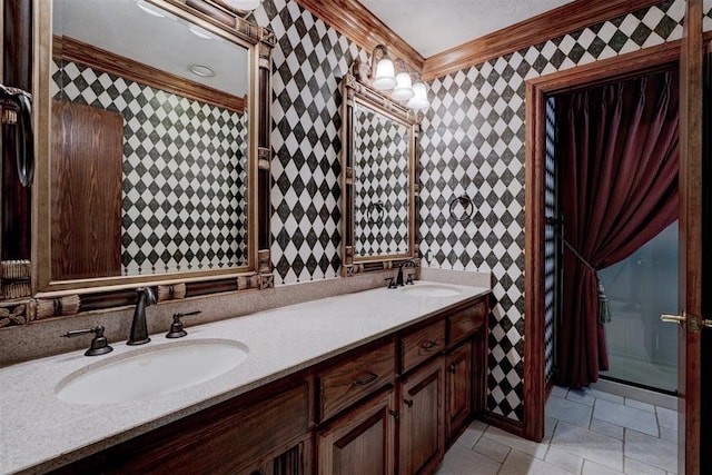 bathroom with vanity and ornamental molding