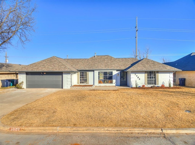 single story home with a garage