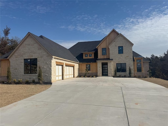 view of front of house featuring a garage and driveway