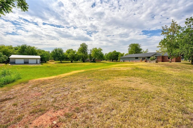 view of yard featuring a garage