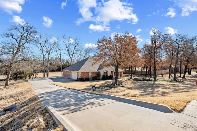 single story home featuring a garage