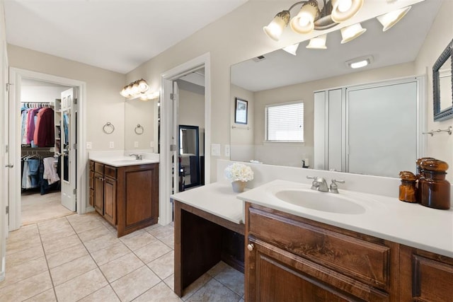 bathroom with tile patterned floors and vanity