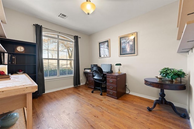 office space featuring light wood-type flooring