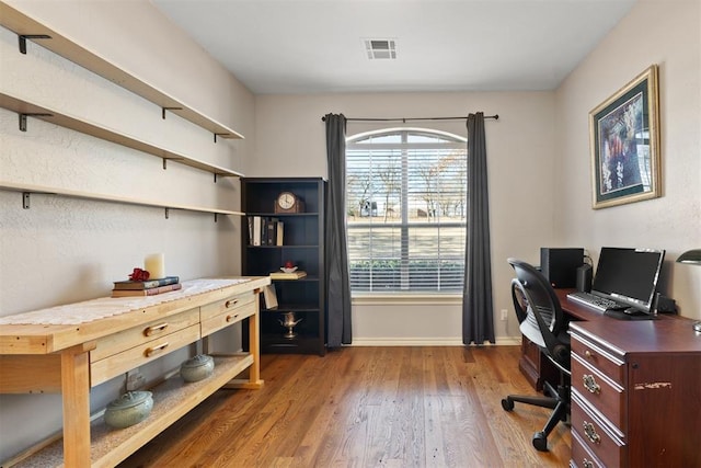 office space featuring hardwood / wood-style floors