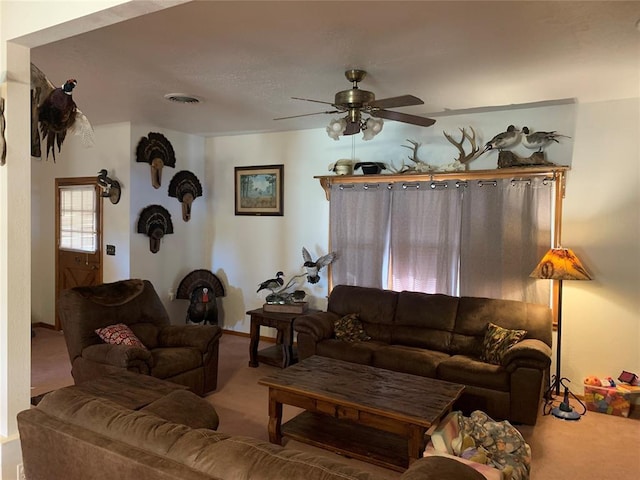 living room with light carpet and ceiling fan